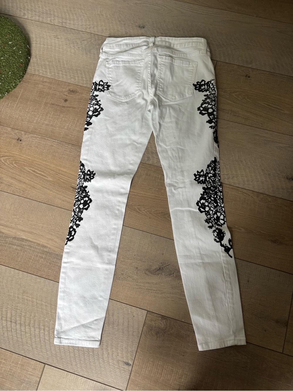 bebe White Skinny Jeans with Black Lace Appliqué - Picture 2 of 3